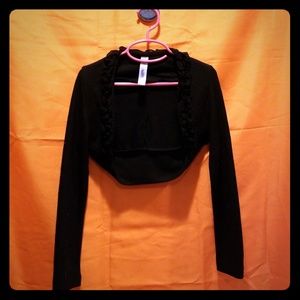 Black shrug with ruffle collar